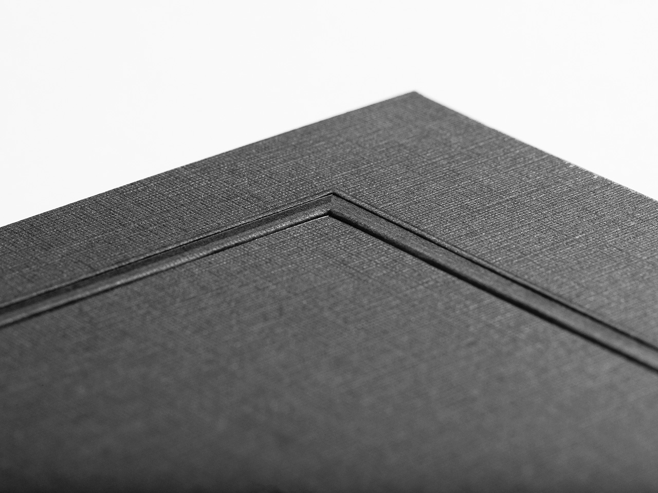 Branded Folders with Embossed Designer Border Example