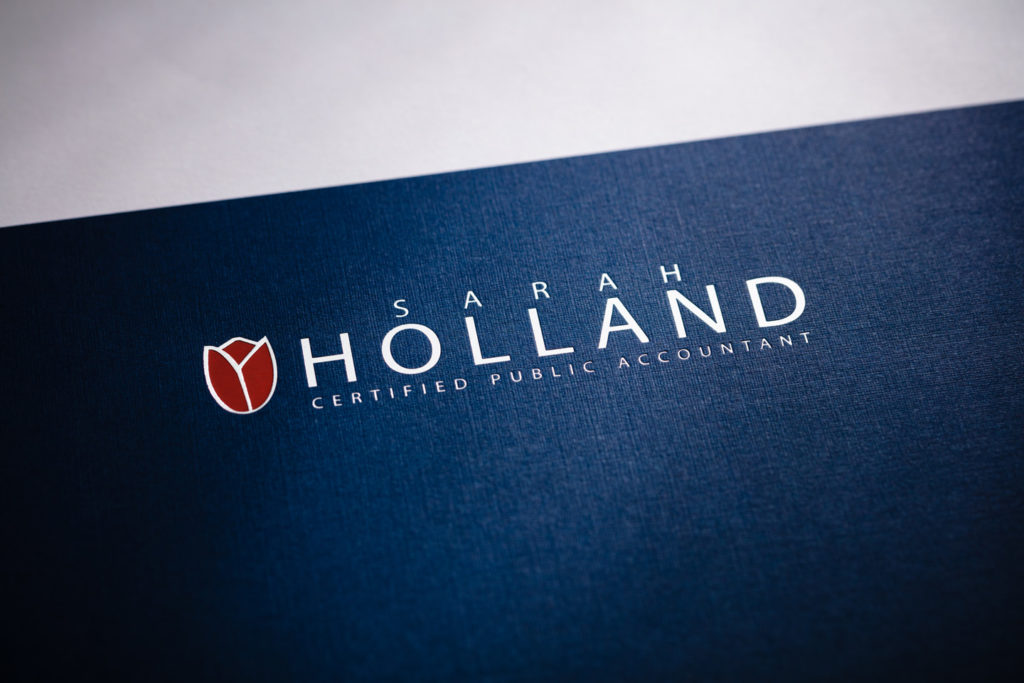 tax folder with silver and red foil