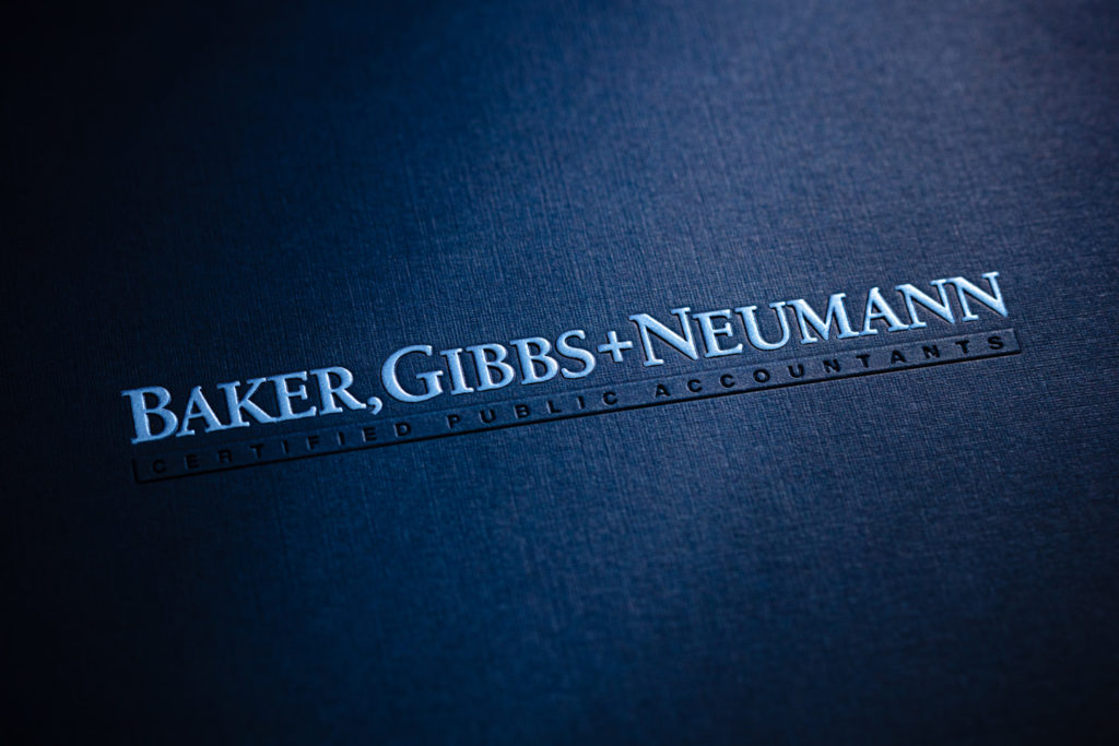 blue tax folder with foil stamped logo