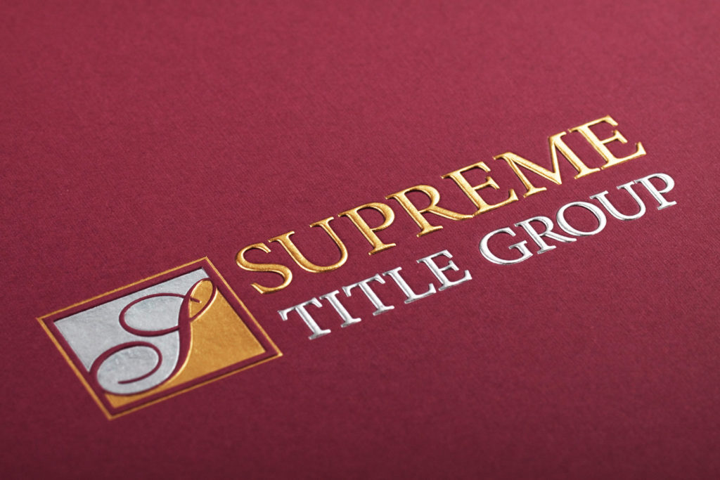 red pocket folder with foil gold and silver foil stamping